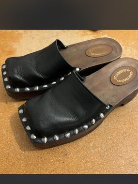 Acne studios Black leather wood studded clogs with grommets size 38. Fits 7.5-8